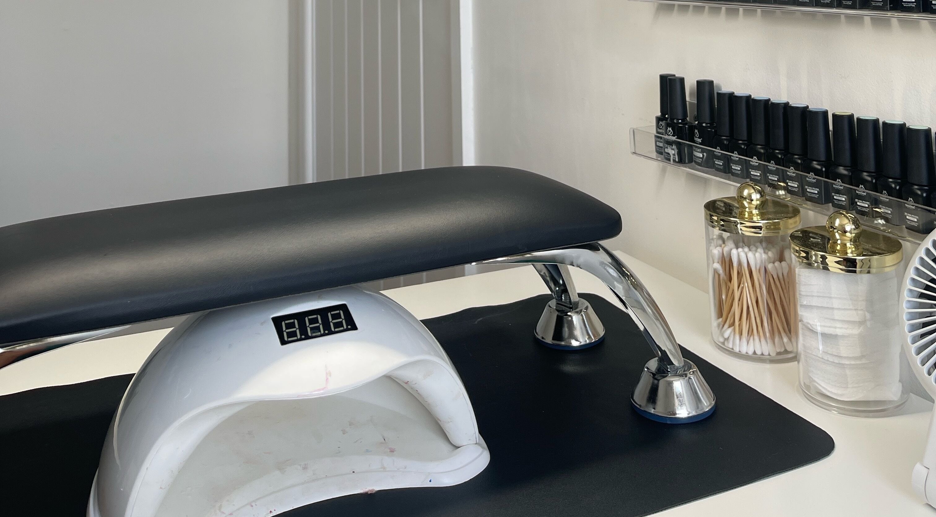 Professional nail station at Elegancewithellie, Walton, England, GB with sleek tools and organized supplies.