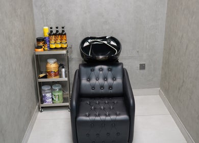 Hair wash station with products at Perfect Image Gents Salon, Sharjah, Sharjah, AE.