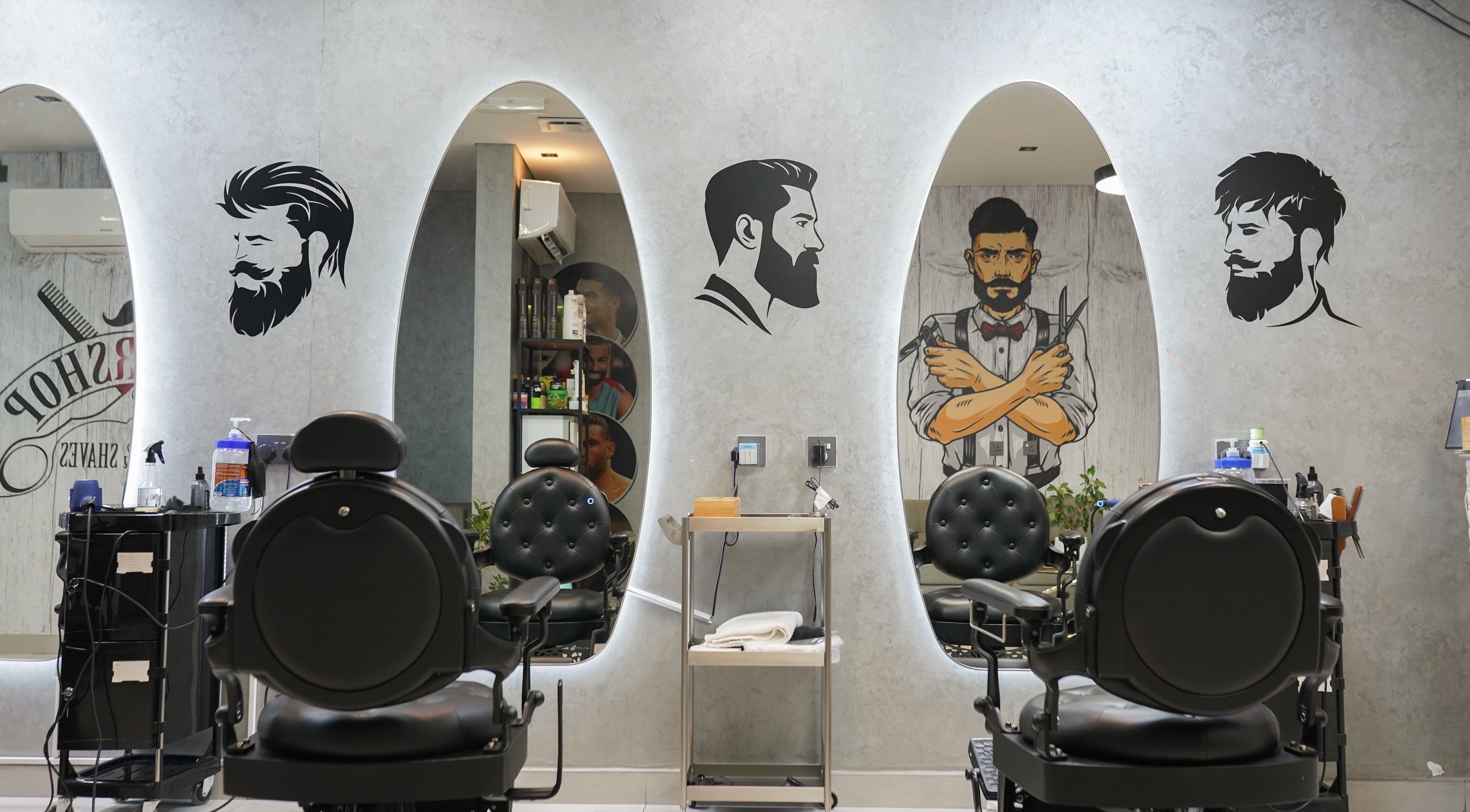 Modern styling chairs at Perfect Image Gents Salon, Sharjah, Sharjah, AE, showcasing luxury grooming facilities.