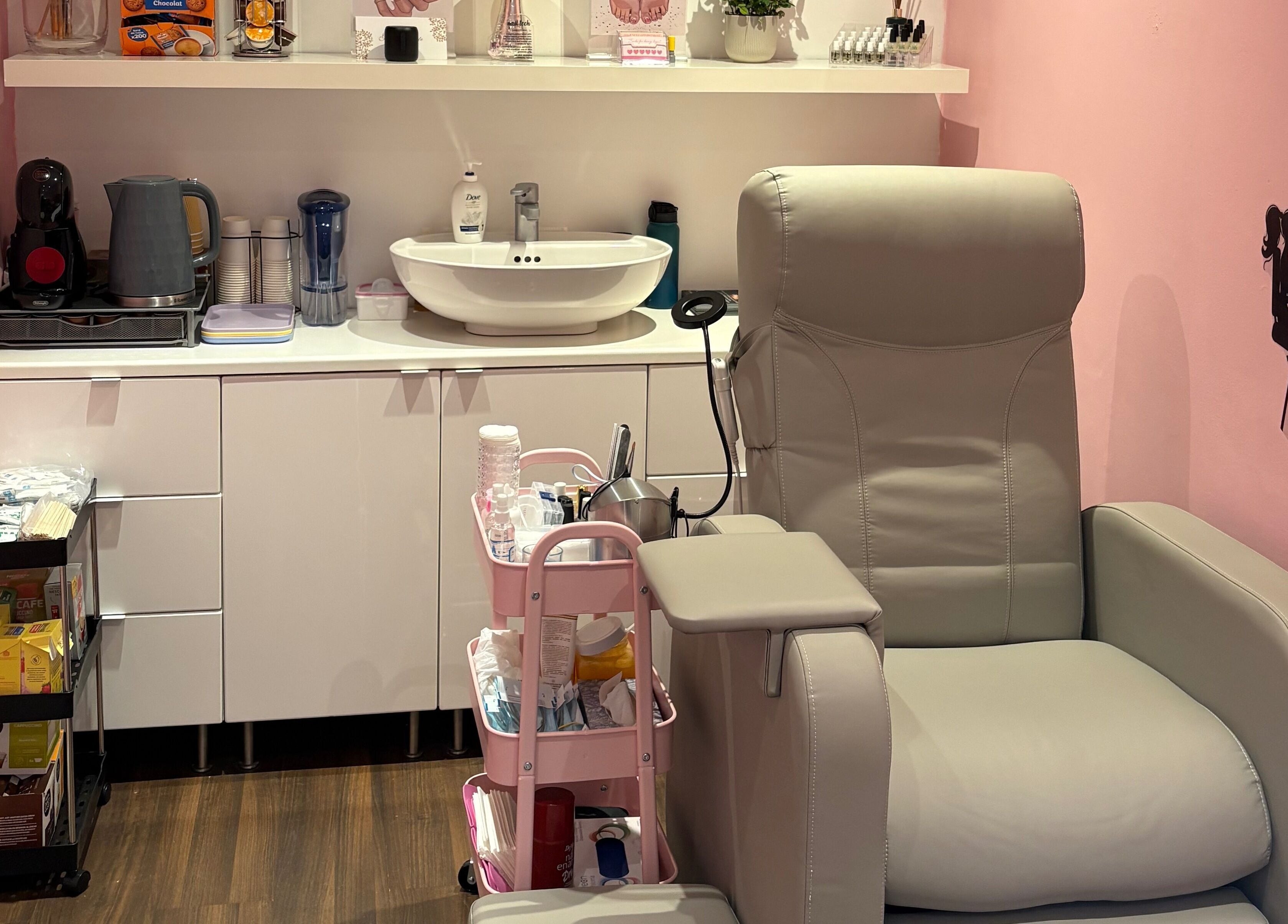 Relaxing nail salon setup at Milita's Nails at Samantha James, Redhill, England, featuring a plush chair and supplies.