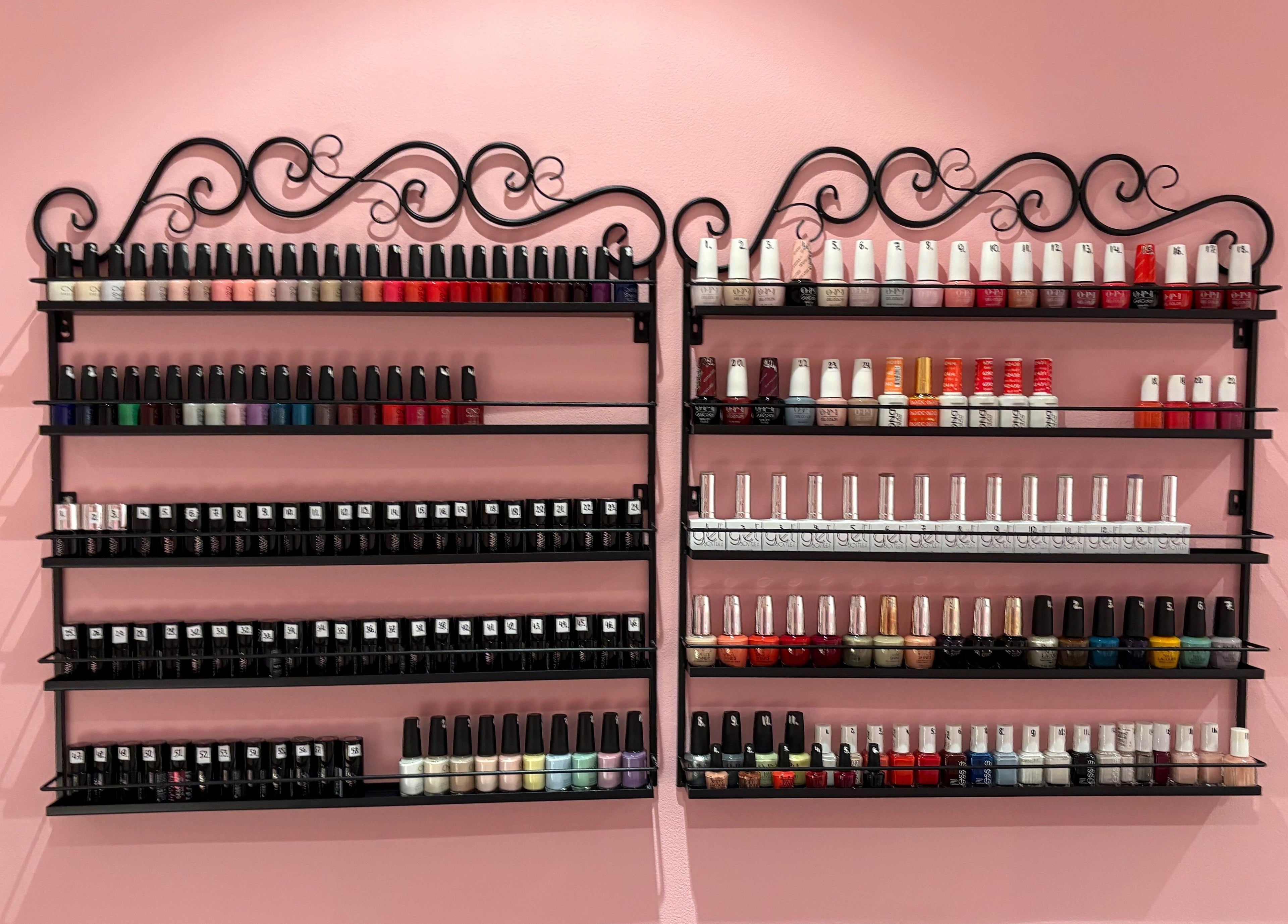 Vibrant nail polish collection at Milita's Nails at Samantha James, Redhill, England, GB.