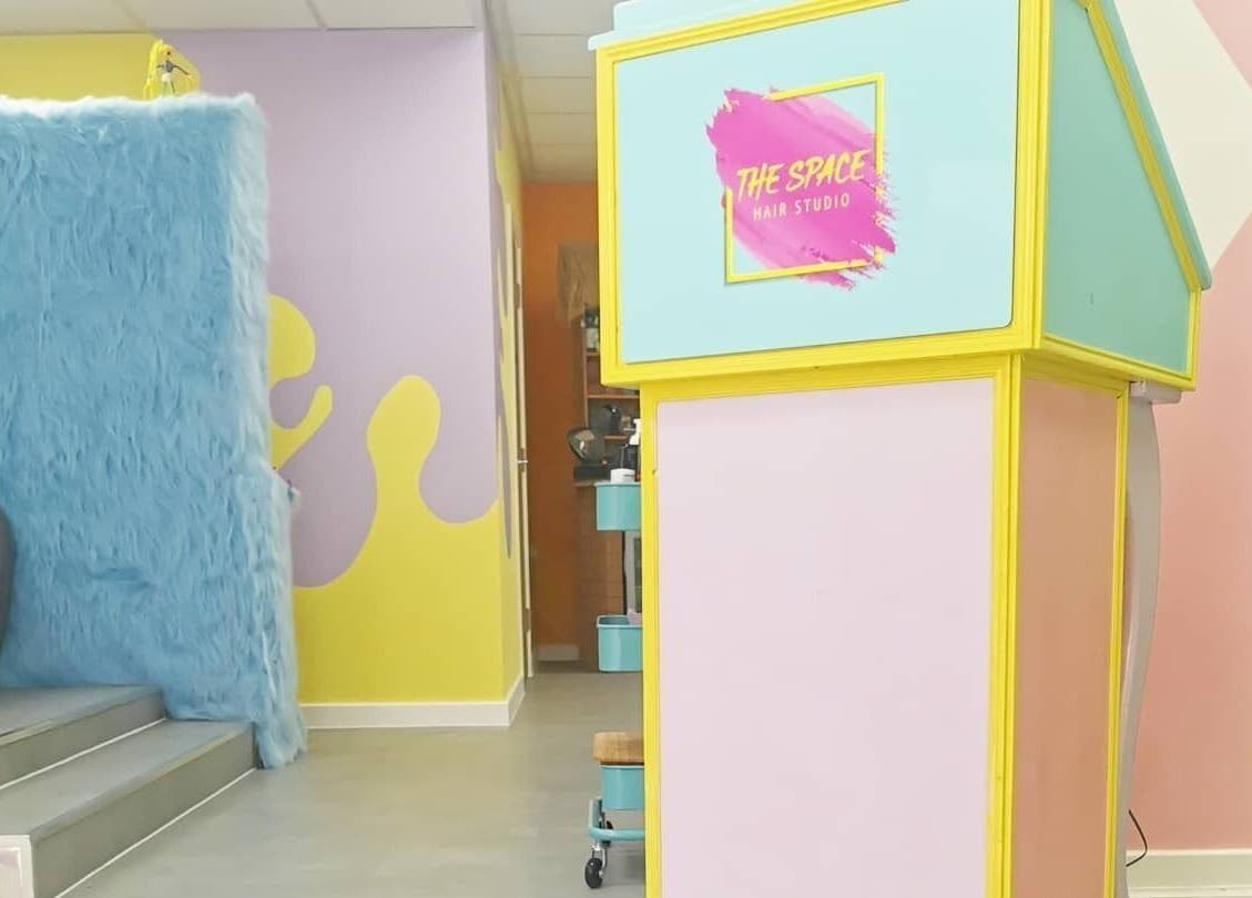 Bright, colorful salon interior at The Space in Southampton, England, GB showcasing modern, eclectic design.