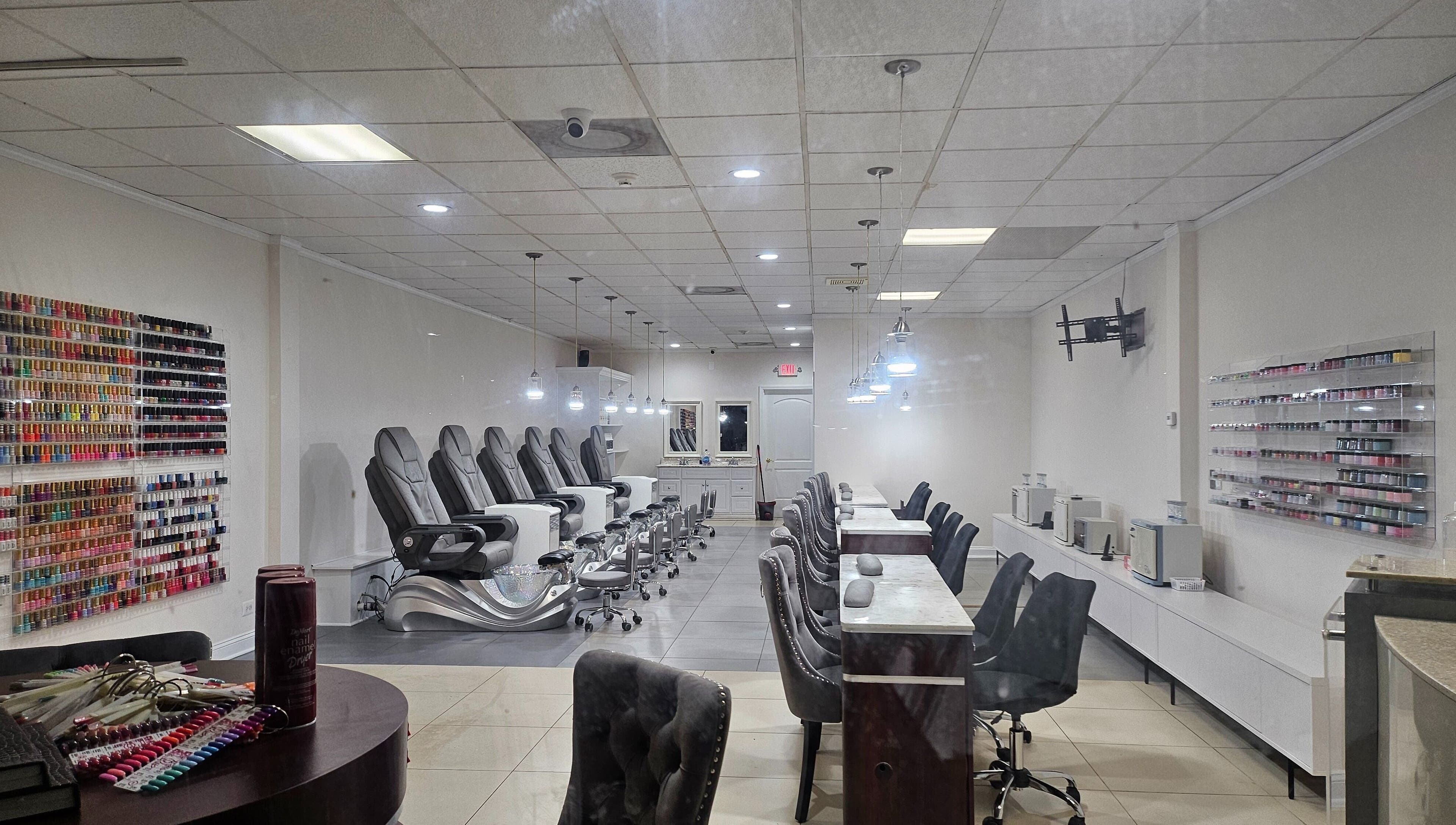 Sleek interior of DIF Nails in Schaumburg, Illinois, US featuring modern nail stations and polish display.