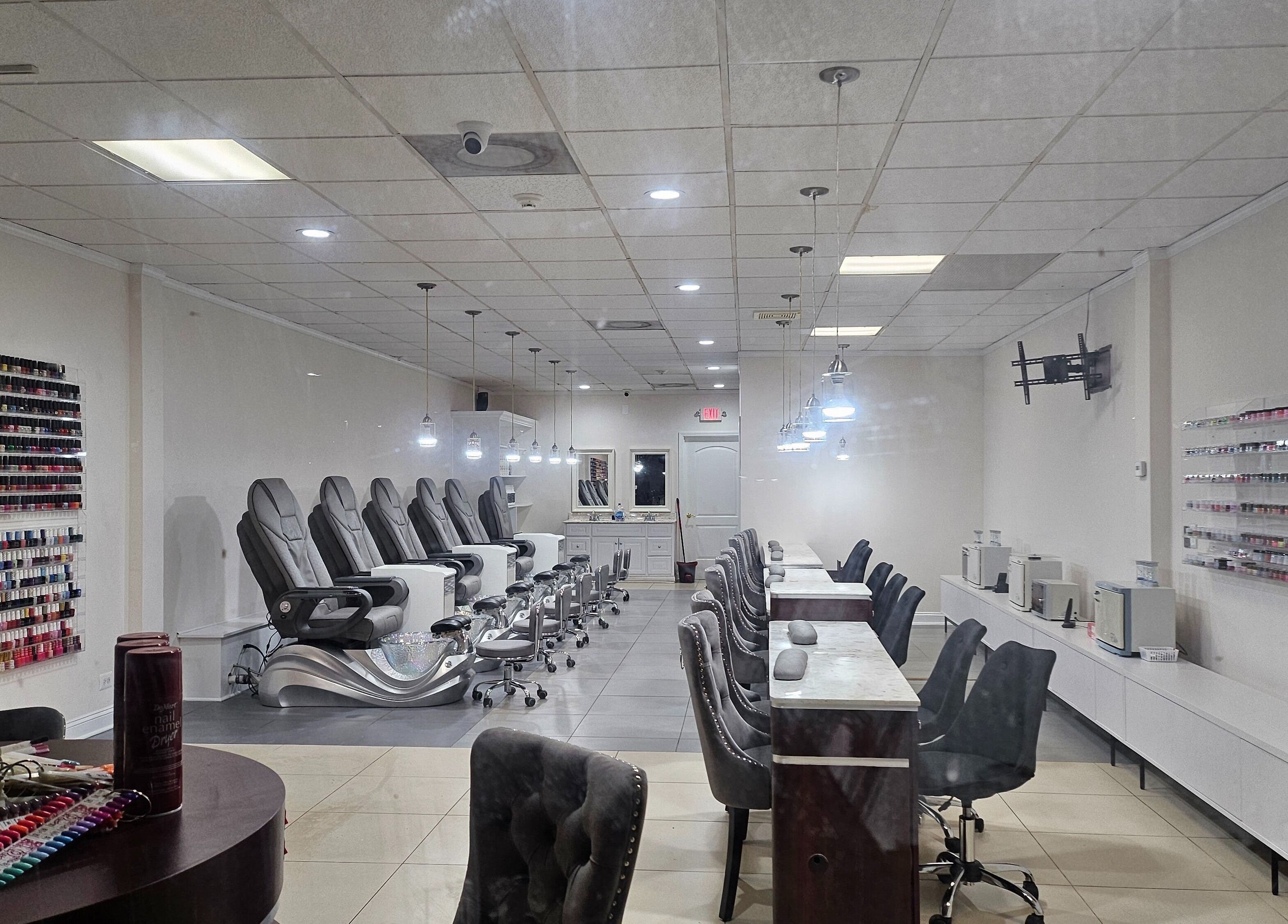 Sleek interior of DIF Nails in Schaumburg, Illinois, US featuring modern nail stations and polish display.