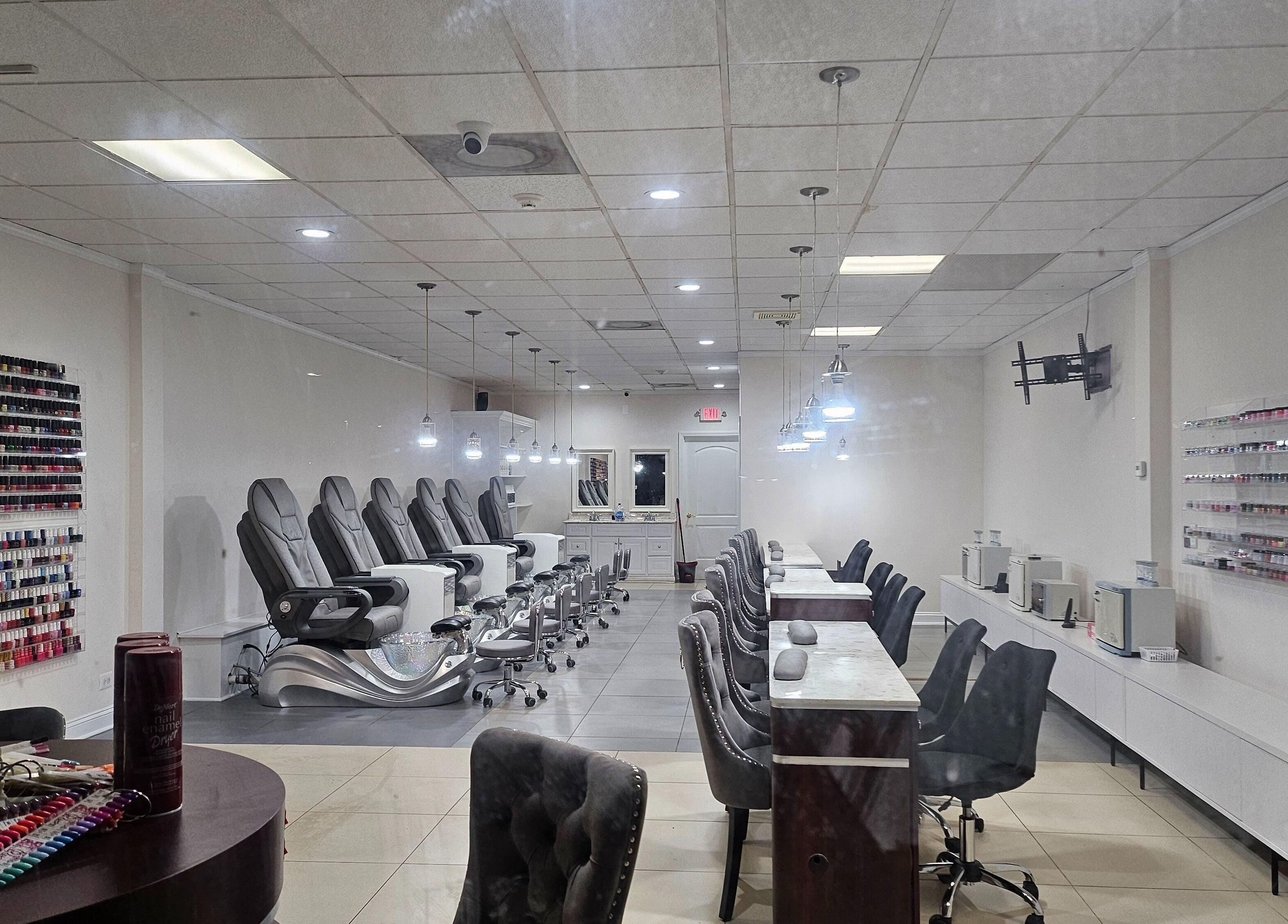 Sleek interior of DIF Nails in Schaumburg, Illinois, US featuring modern nail stations and polish display.