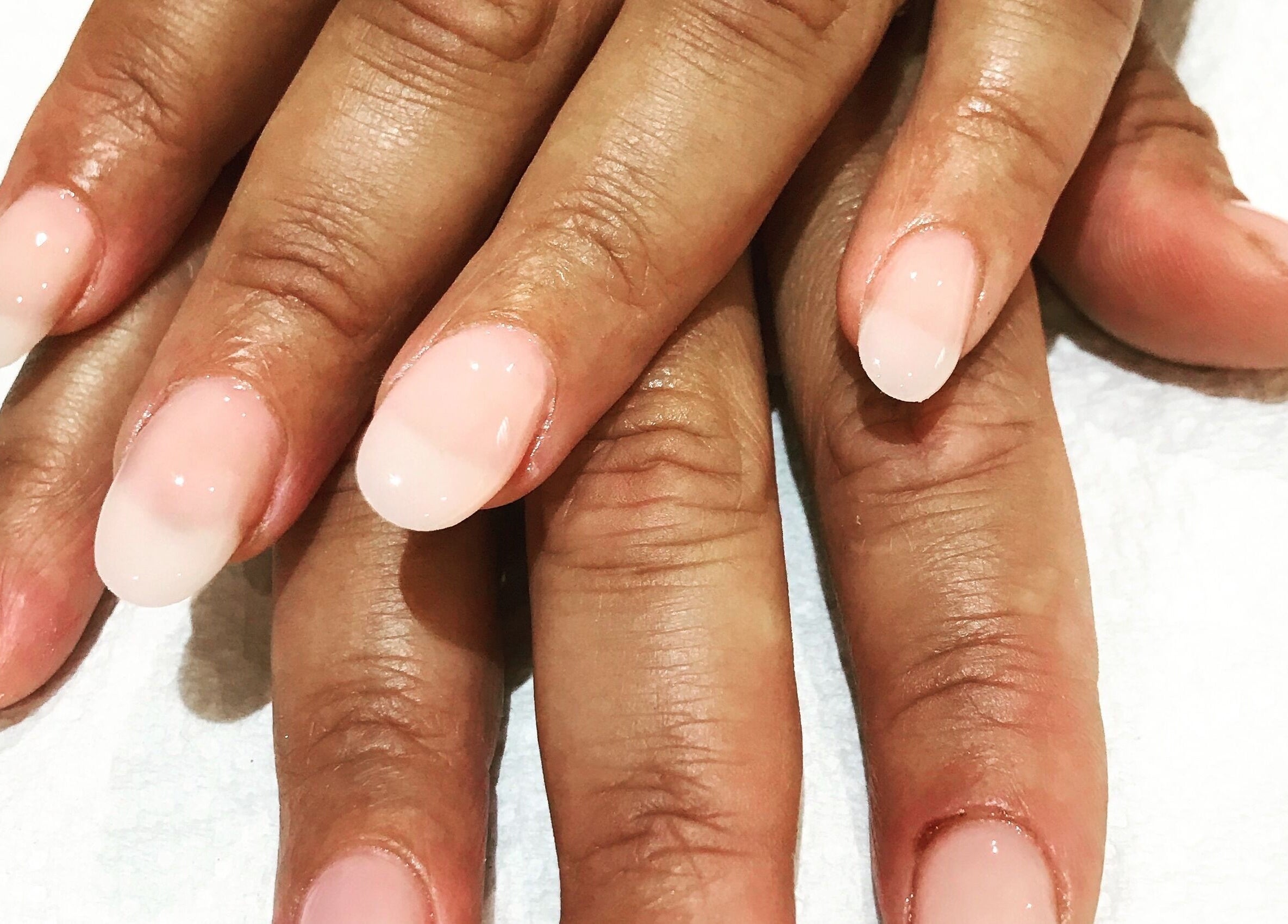 Elegant manicure at Oval & Arch at 17 Mary Days Goudhurst, Goudhurst, England, GB showcasing polished nails.