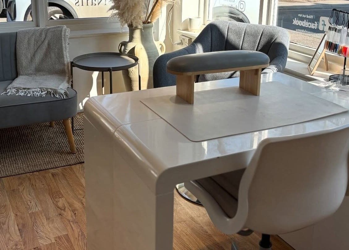 Cozy seating and nail station at Oval & Arch at Nuve Clinic, Cranbrook, England, GB.