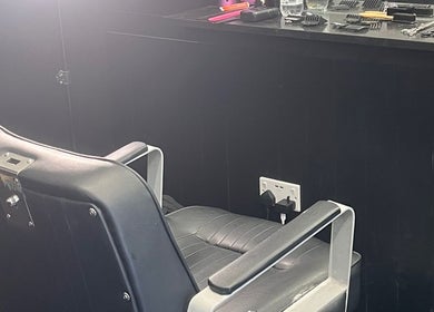 Stylish salon chair at Stevenconroyhair, Portlaoise, County Laois, IE, highlighting professional setup.
