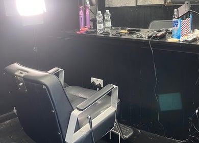 RUDEBOYS barber chair and grooming tools in Portlaoise, County Laois, IE create a chic and modern atmosphere.