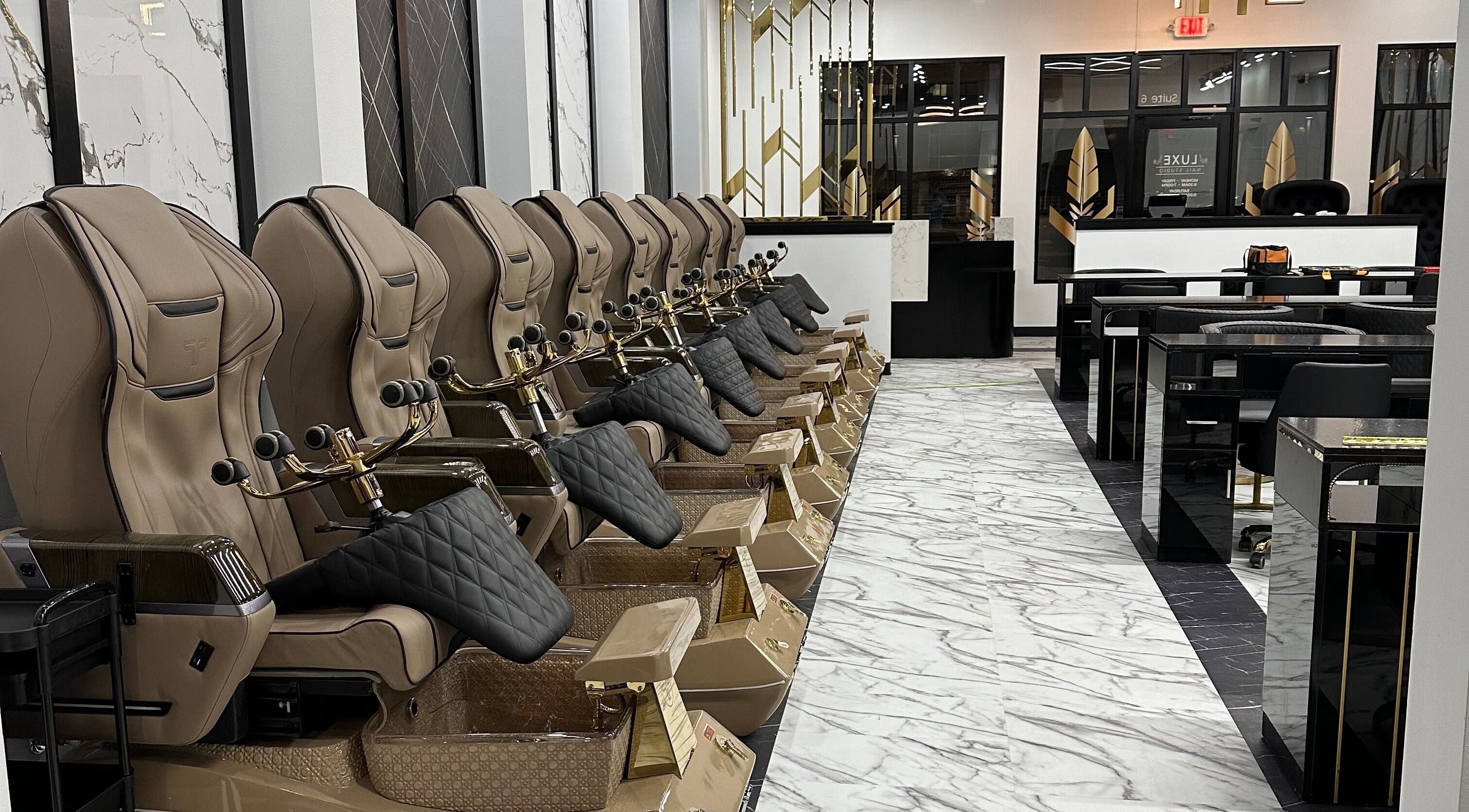Luxurious nail spa chairs at Luxe Nail Studio, Madison, Wisconsin, US, showcasing modern comfort and style.