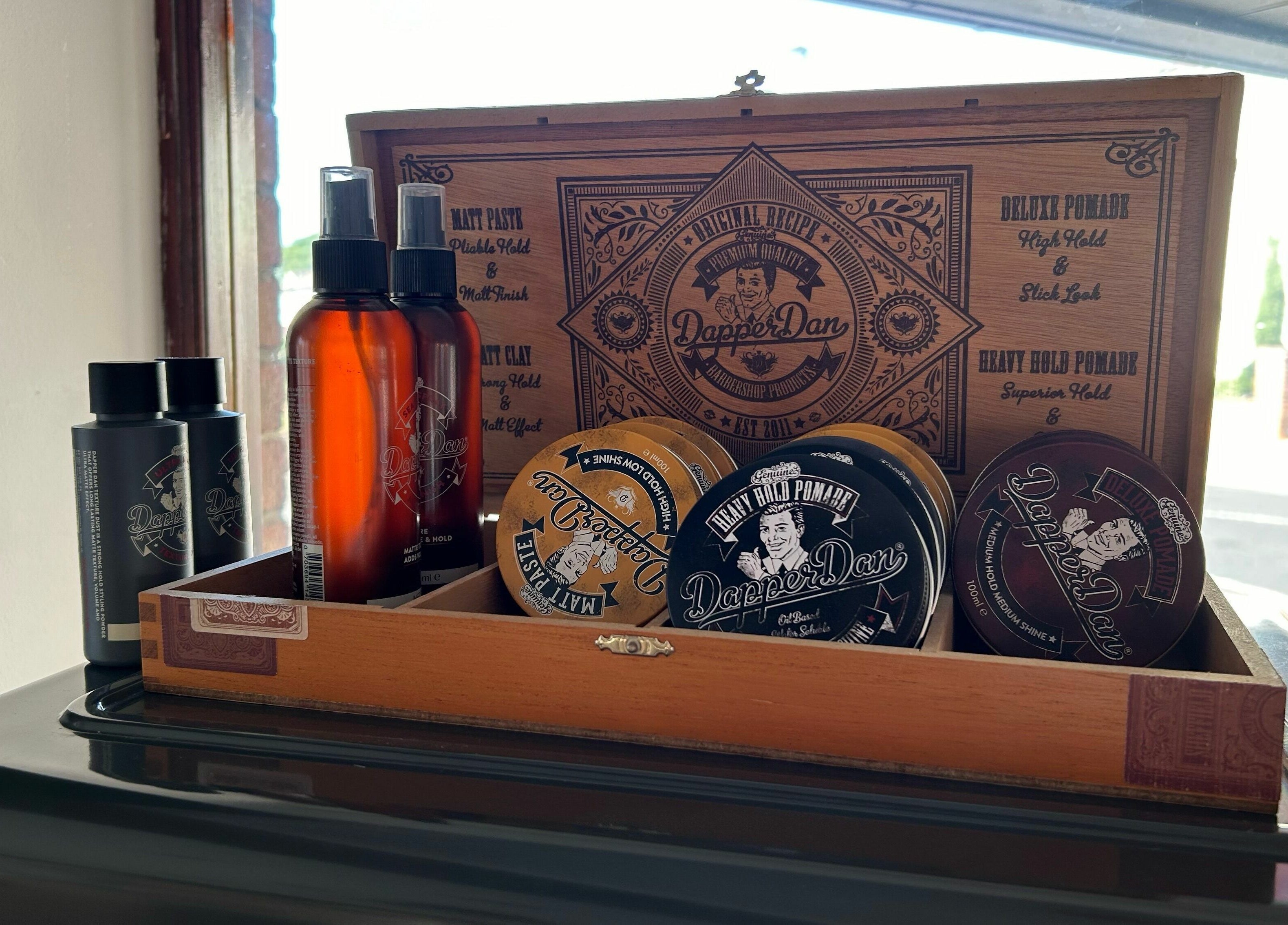 Dapper Dan grooming products on display at Hayling Barbershop, Hayling Island, England, GB.