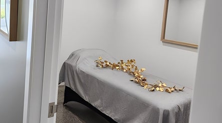 Relaxing massage room at Daisy Rose Beauty by Design in Bridgewater, Tasmania, AU, with serene decor and calming ambiance.