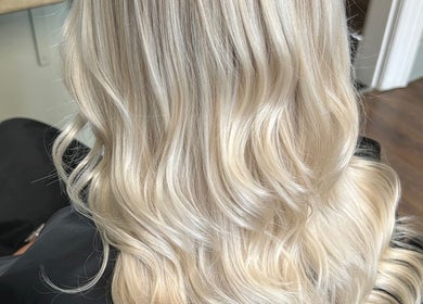 Blonde hair with waves at SC Hair Design in Thirsk, England, GB showcasing expert styling.