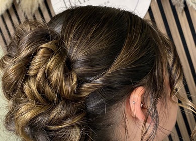 Intricate braided updo at SC Hair Design, Thirsk, England, GB, showcasing expert styling.