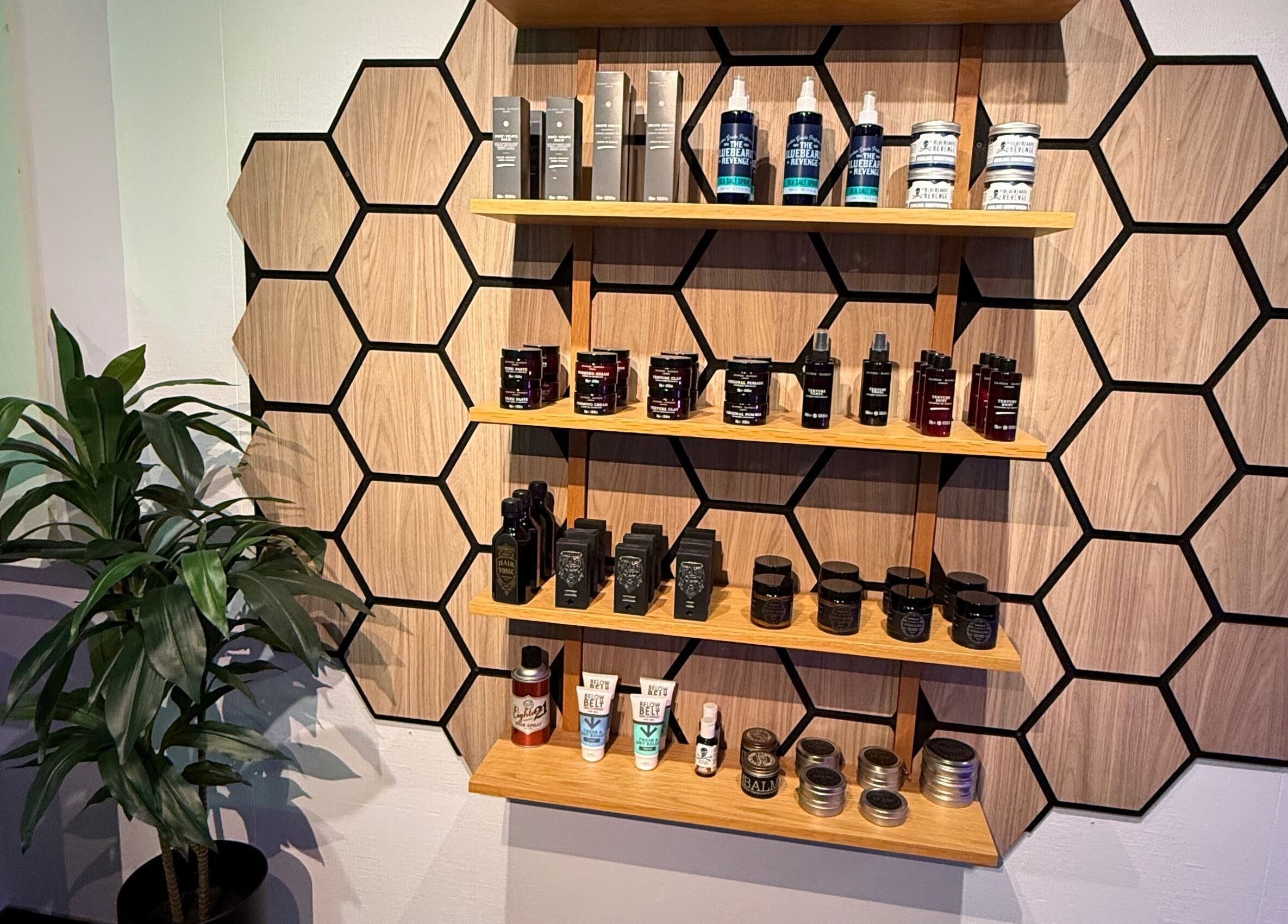Grooming products on hexagon shelves at B the barber in Tórshavn, Streymoyar, FO.