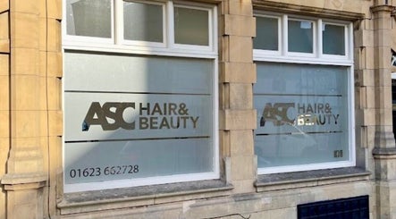 Elegant storefront of Lotus Skin, Beauty and Wellness in Mansfield, England, GB, showcasing modern branding.