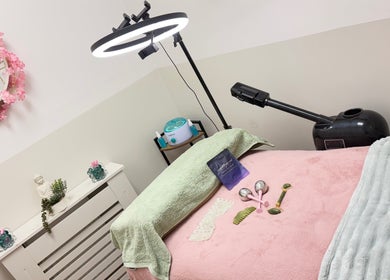 Relaxing spa room at Lotus Skin, Beauty and Wellness in Mansfield, England, GB, featuring a cozy treatment bed.