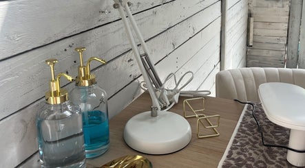 Stylish workstation at Glow Nails, Bournemouth, England, GB, showcasing elegant tools and products.