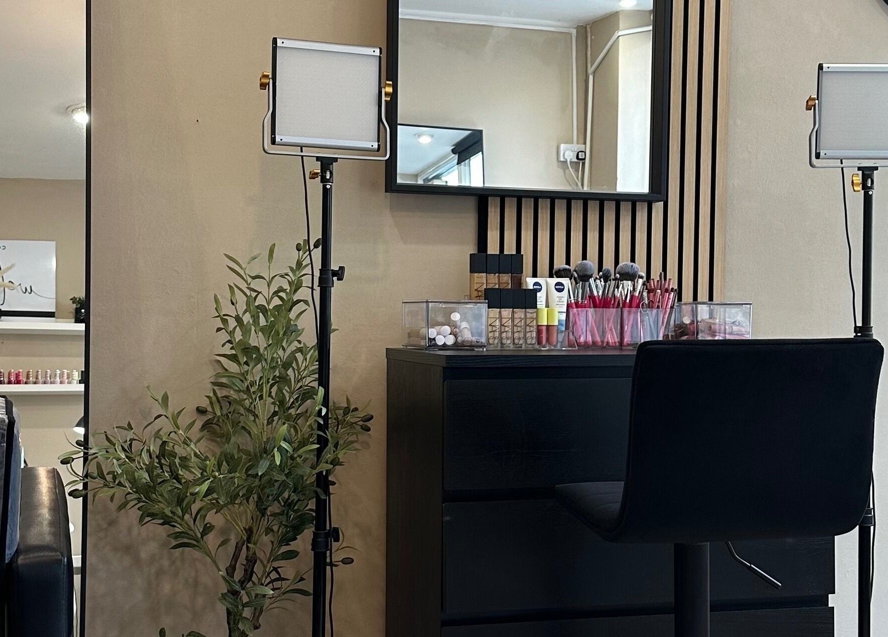 Professional makeup station at Coley’s Beauty, Preston, England. Elegant and modern setup with brushes and products.