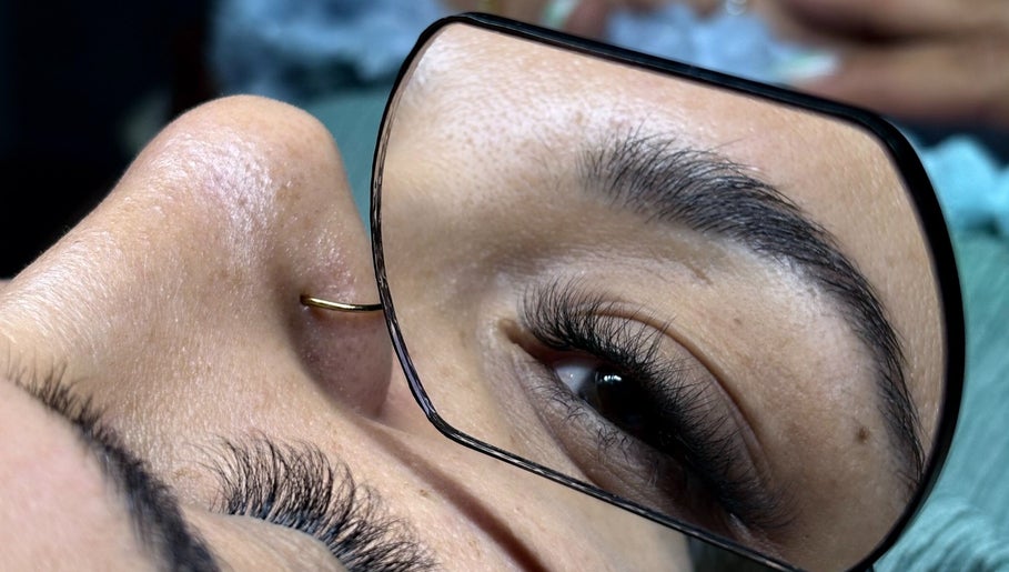 Close-up of eye with eyelash extensions at Perle - Sugaring & Eye Beauty Treatments, Bali, Bali, ID.
