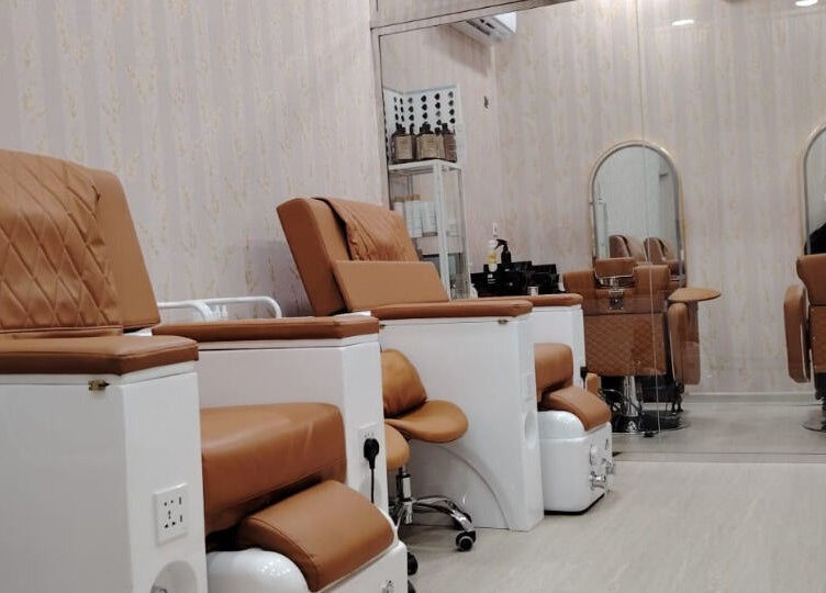 Relax in luxury pedicure chairs at TMH SALON & SPA, Doha, Doha Municipality, QA. Perfect for self-care sessions.