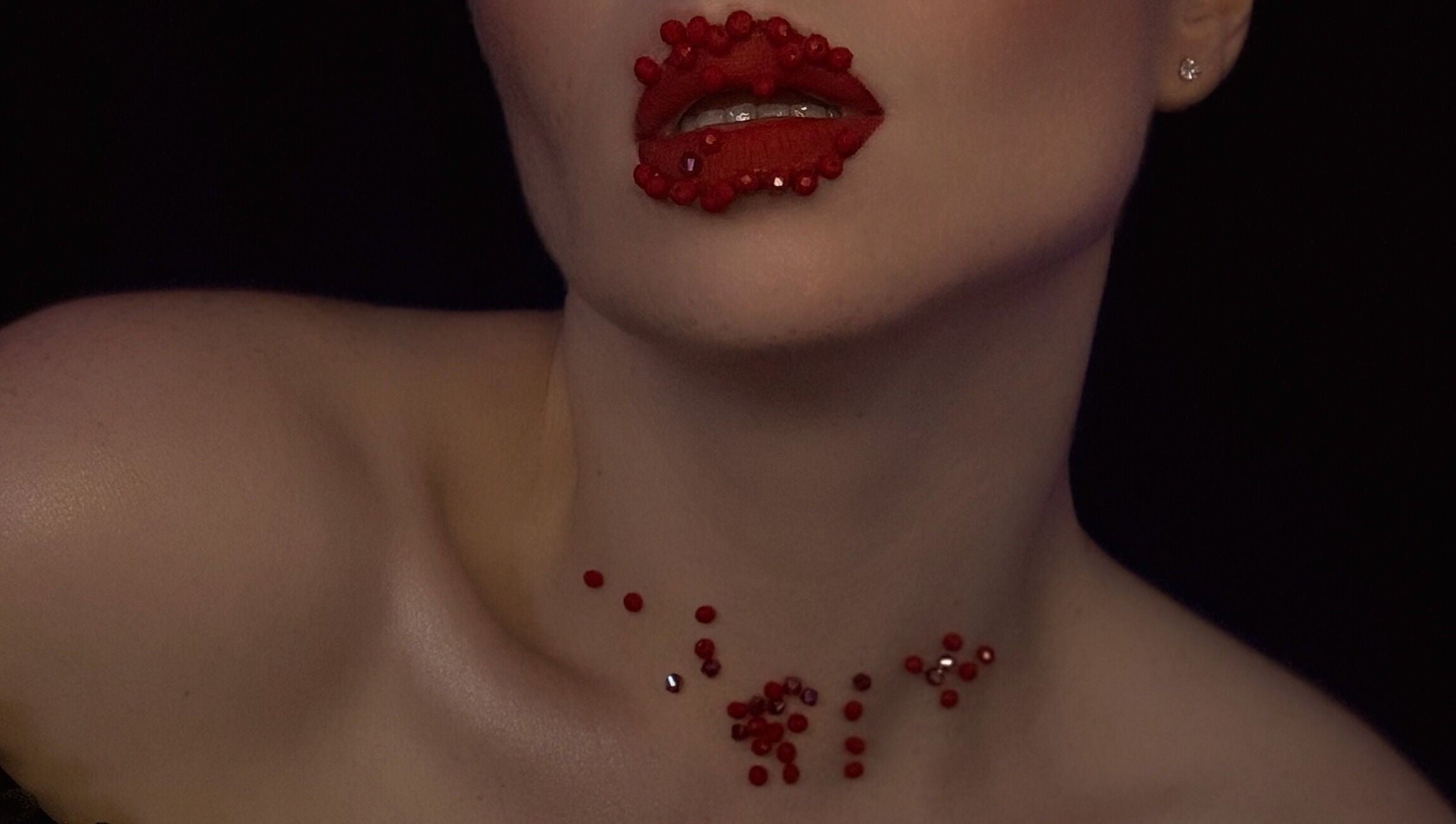 Close-up of bejeweled red lips at Makeup by Kate, Mountain View, California, US.