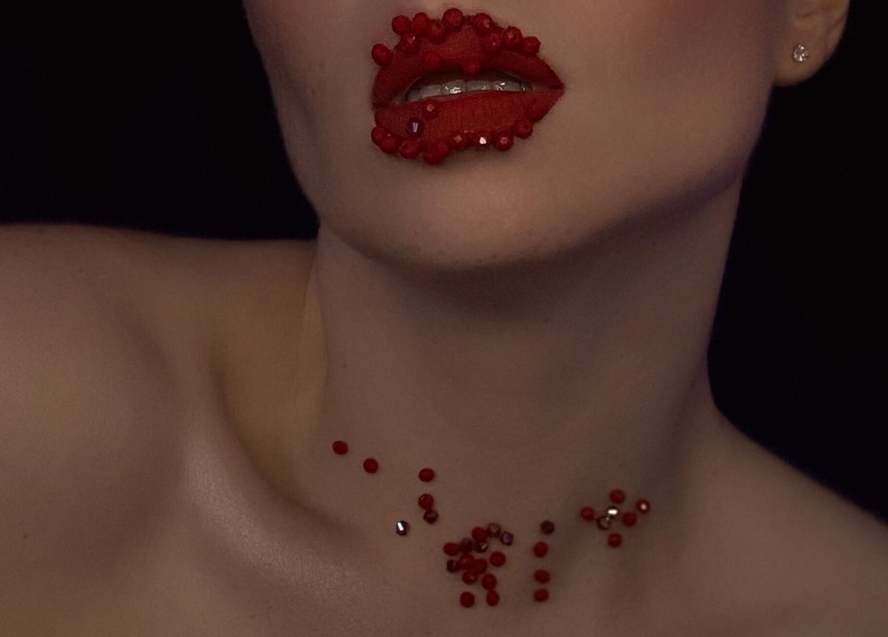 Close-up of bejeweled red lips at Makeup by Kate, Mountain View, California, US.