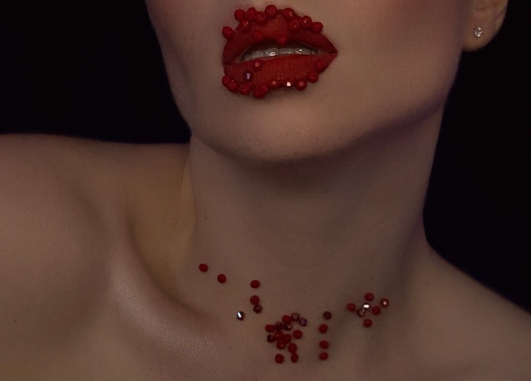 Close-up of bejeweled red lips at Makeup by Kate, Mountain View, California, US.