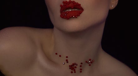 Close-up of bejeweled red lips at Makeup by Kate, Mountain View, California, US.