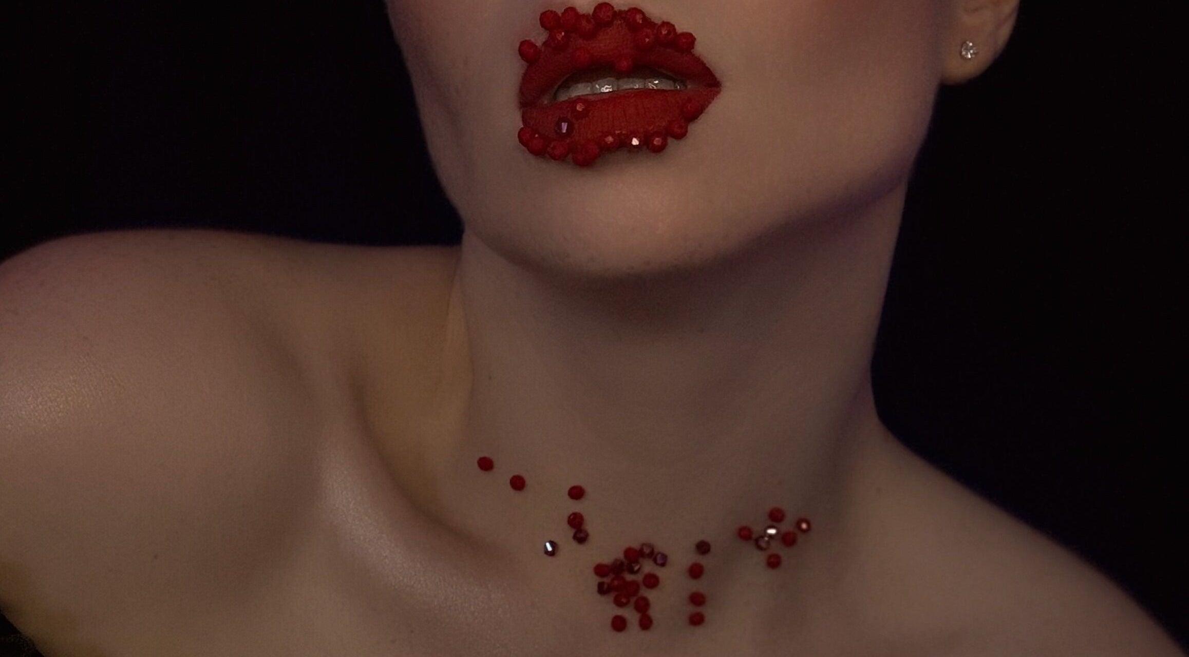 Close-up of bejeweled red lips at Makeup by Kate, Mountain View, California, US.