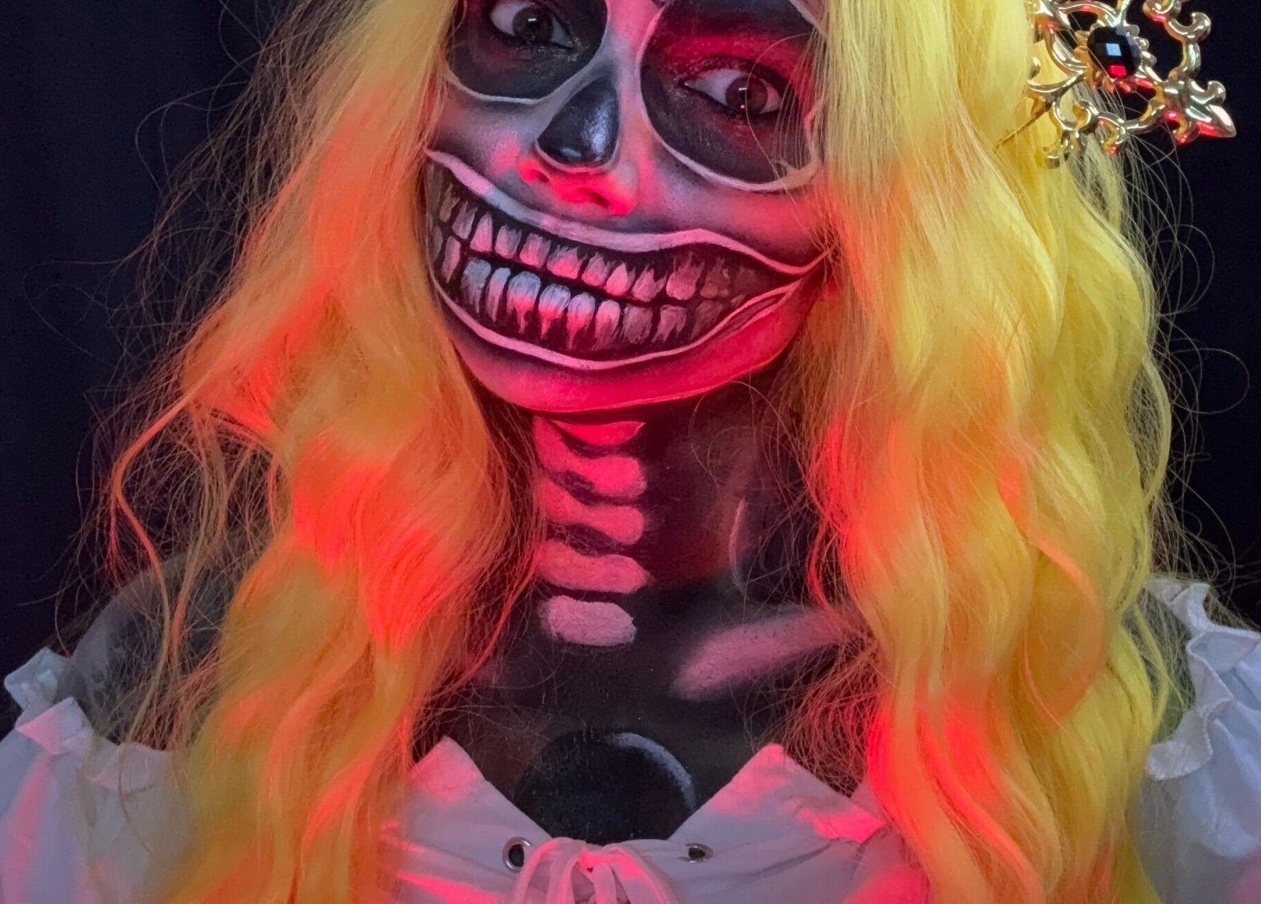 Creative Halloween makeup by Makeup by Kate in Mountain View, California, US, featuring a vibrant skeleton design.