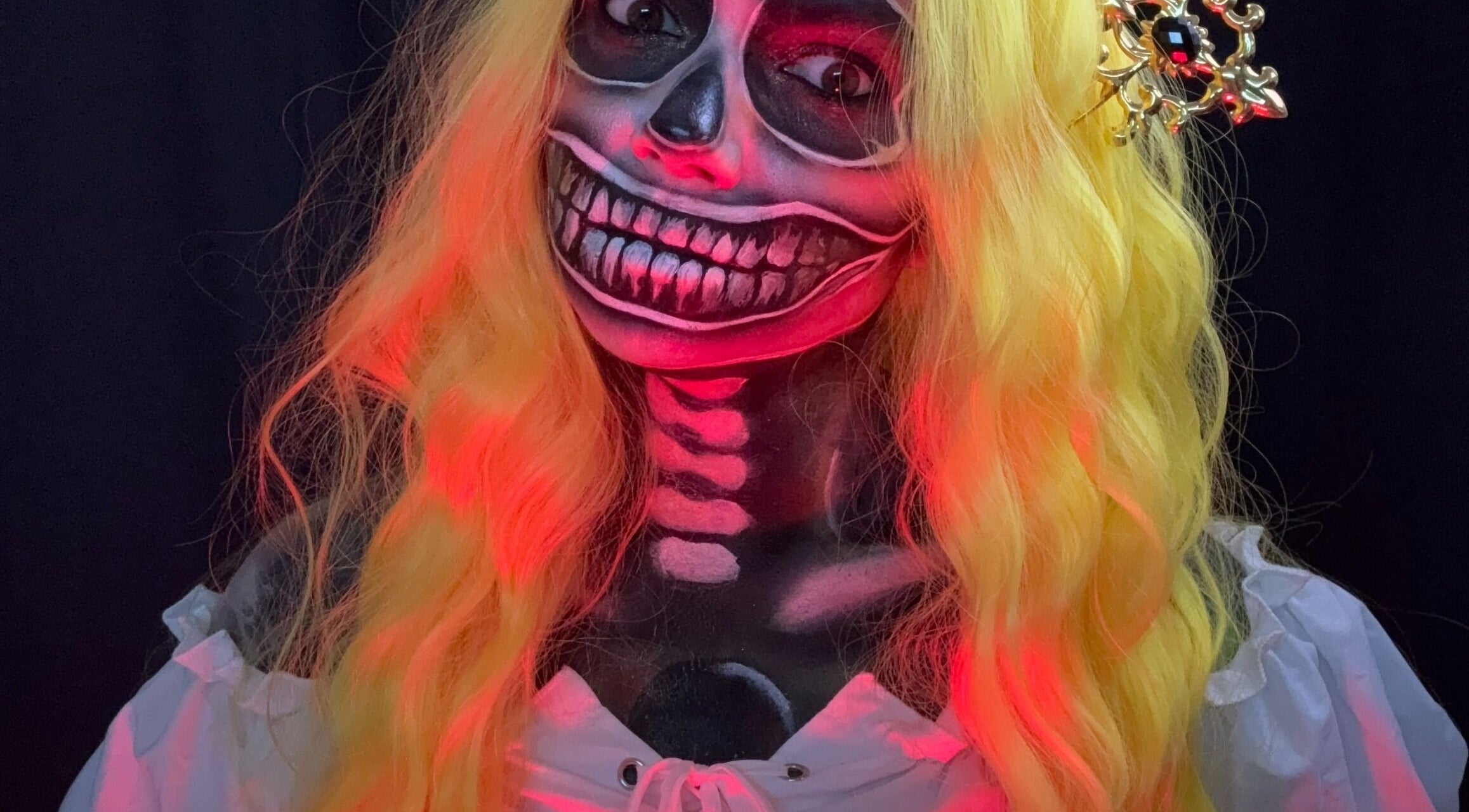 Creative Halloween makeup by Makeup by Kate in Mountain View, California, US, featuring a vibrant skeleton design.