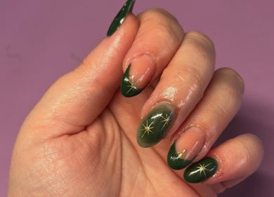 Elegant green star-themed nail art from Just Jess Nails in Cheltenham, England, GB.