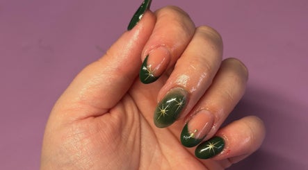 Elegant green star-themed nail art from Just Jess Nails in Cheltenham, England, GB.