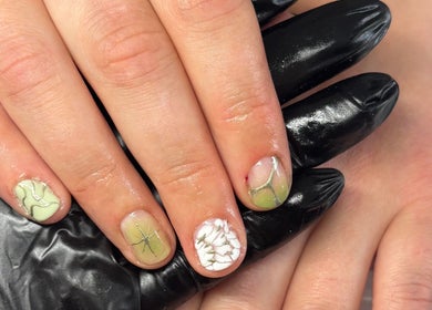 Unique nail art design at Just Jess Nails, Cheltenham, England, GB with green and white patterns.