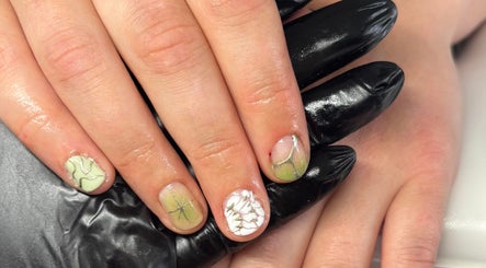 Unique nail art design at Just Jess Nails, Cheltenham, England, GB with green and white patterns.