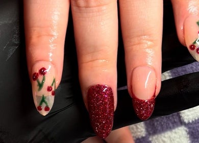 Festive cherry and glitter nails at Just Jess Nails, Cheltenham, England, GB.