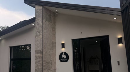 Elegant entrance of Lavish Seven Beauty Bar in Annangrove, New South Wales, AU with modern lighting.