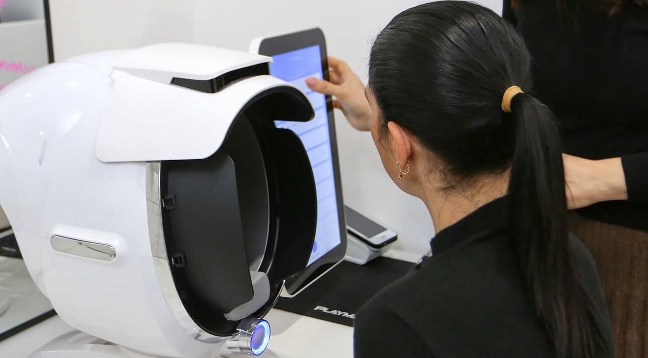 Customer undergoing high-tech skin analysis at Lavish Seven Beauty Bar, Annangrove, New South Wales, AU.