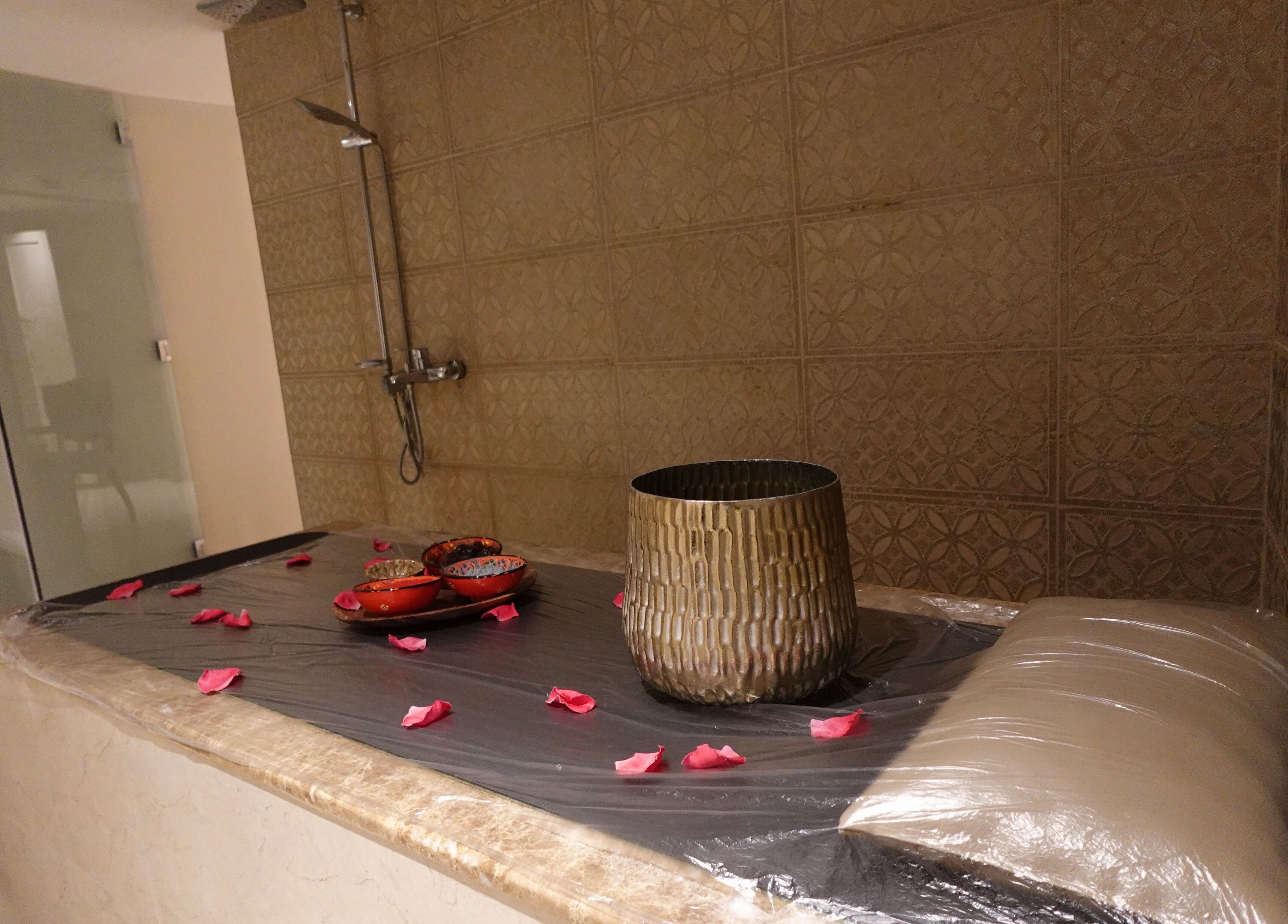 Luxurious spa setup at Notes Salon, Dammam, Eastern Province, SA with roses and elegant decor.