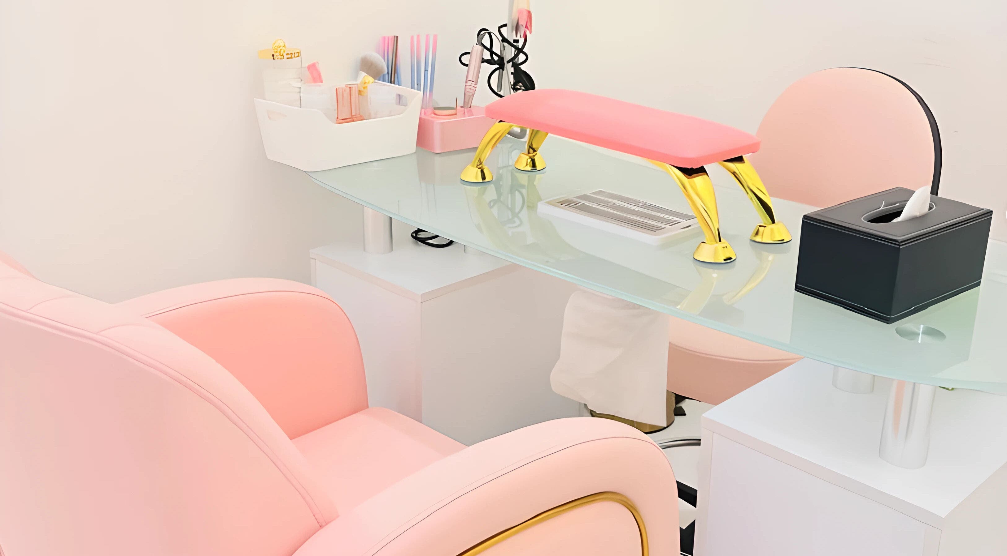Chic nail station at Bellezza Beauty Saloon, Ras Al-khaimah, Ras Al Khaimah, AE featuring a pink chair.