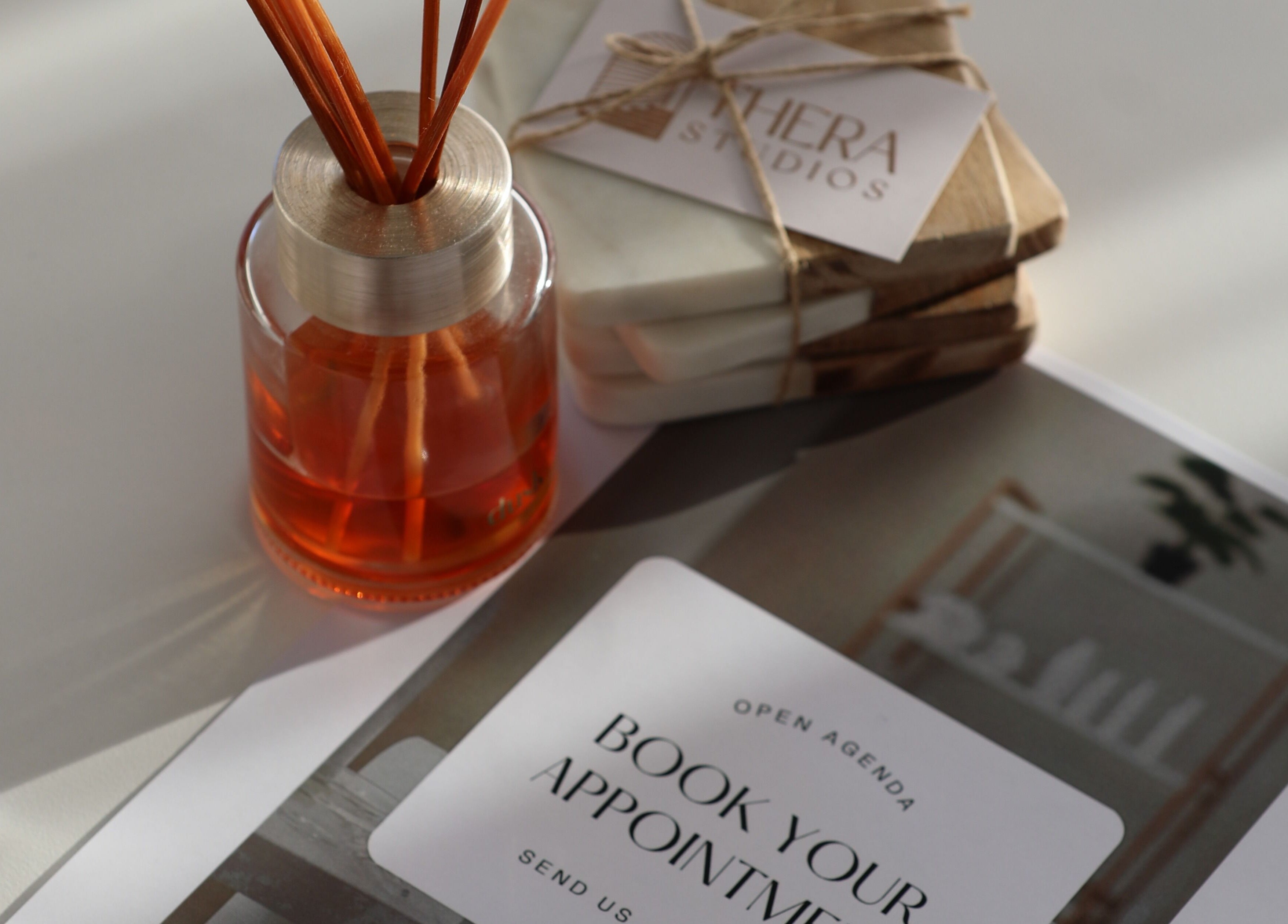 Luxlashnbeautybar booking invite beside aroma diffuser, Watanobbi, New South Wales, AU.