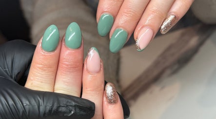 Stylish nail design with green and gold at Nails by Bryony Artist & Co., Rugby, England, GB.