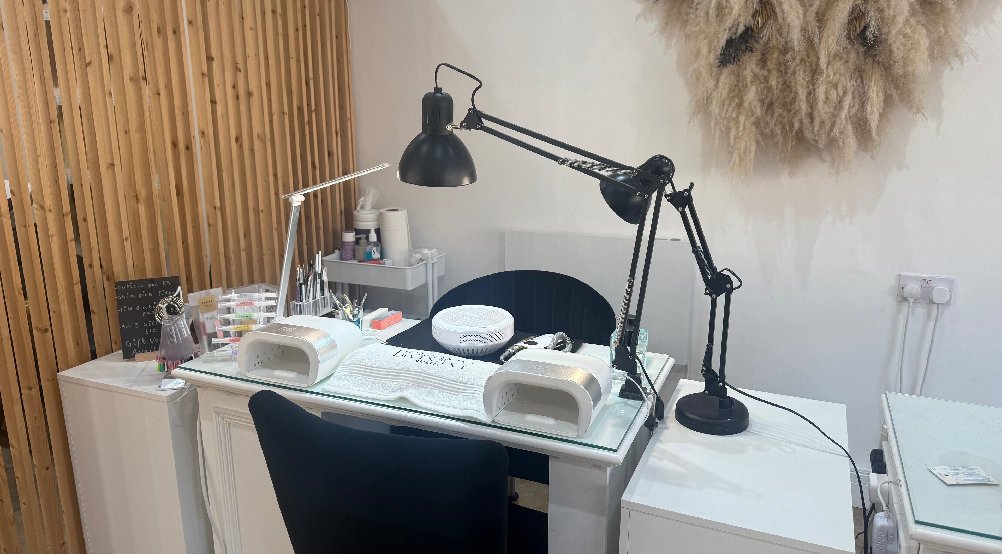 Nail station at Nails by Bryony Artist & Co. in Rugby, England, GB, featuring modern decor and nail tools.