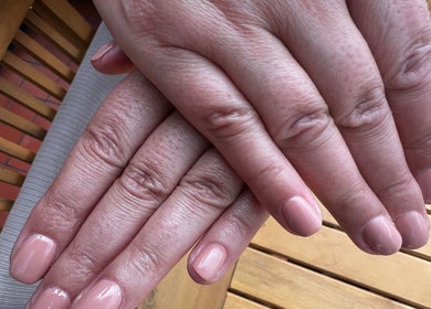 Freshly manicured hands at Lumiere Mobile Beauty Services in Cambridge, England, GB.