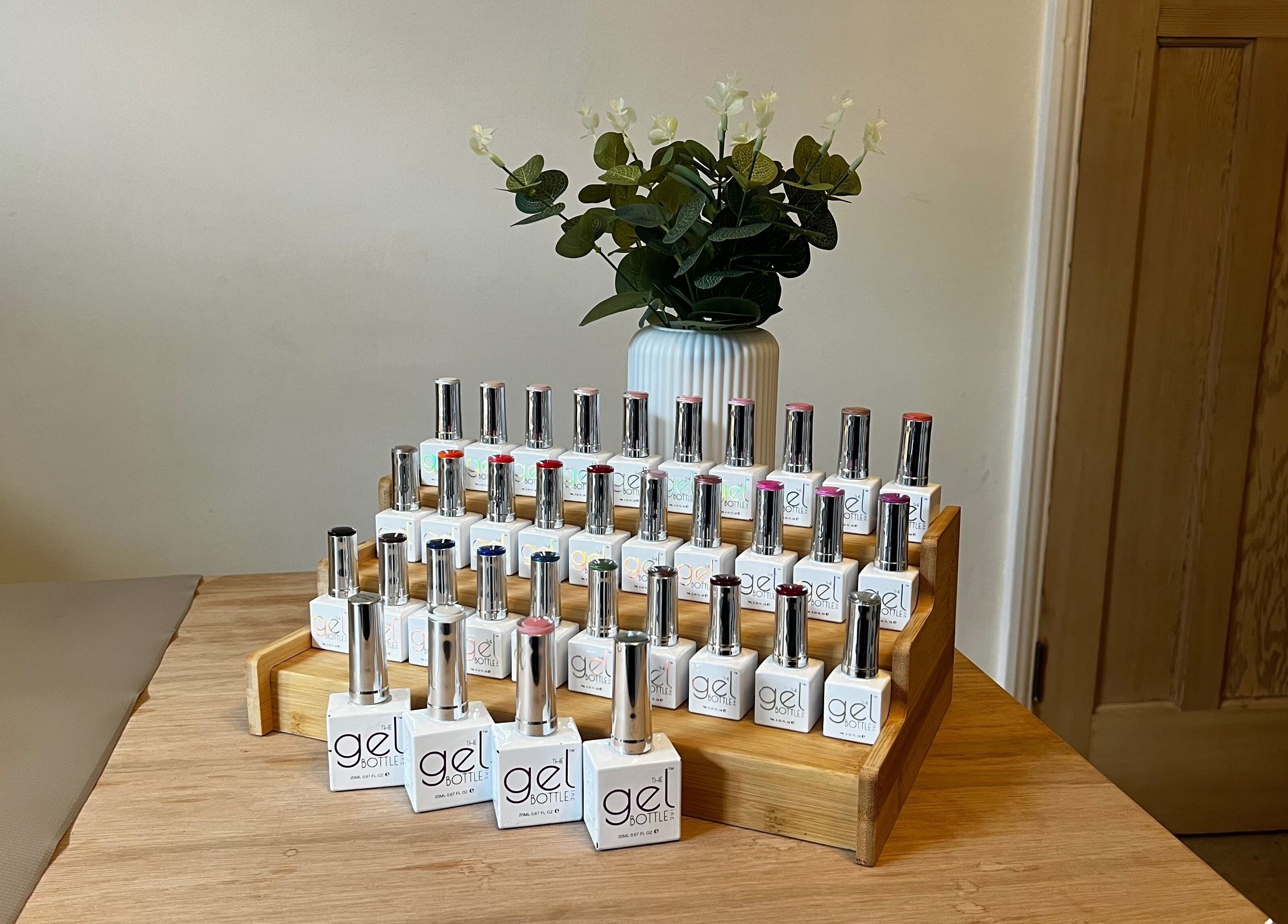 Display of gel polishes at Lumiere Beauty, Cambridge, England, GB, enhancing elegance and style.