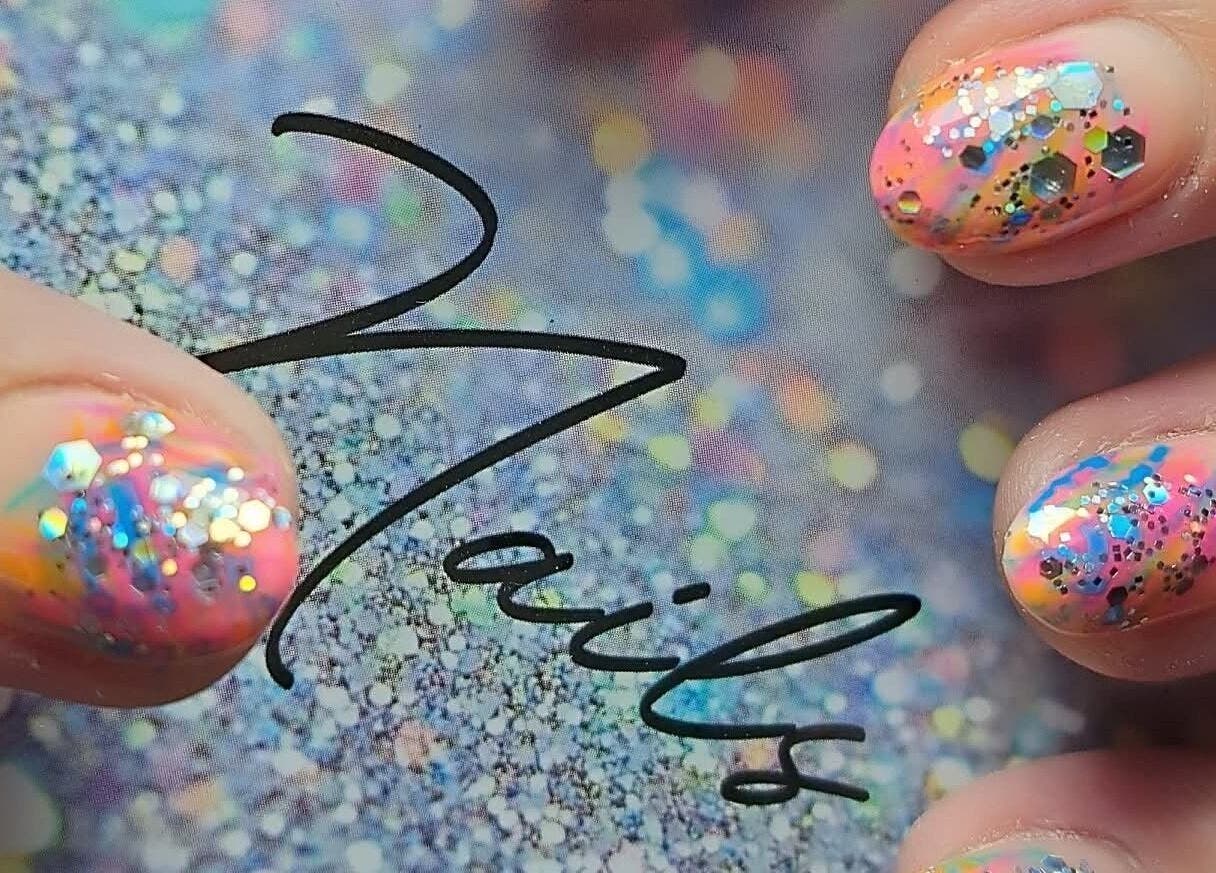 Colorful glitter nail art at Luna Rose Nail Bar, Benoni, Gauteng, ZA. Eye-catching and vibrant.