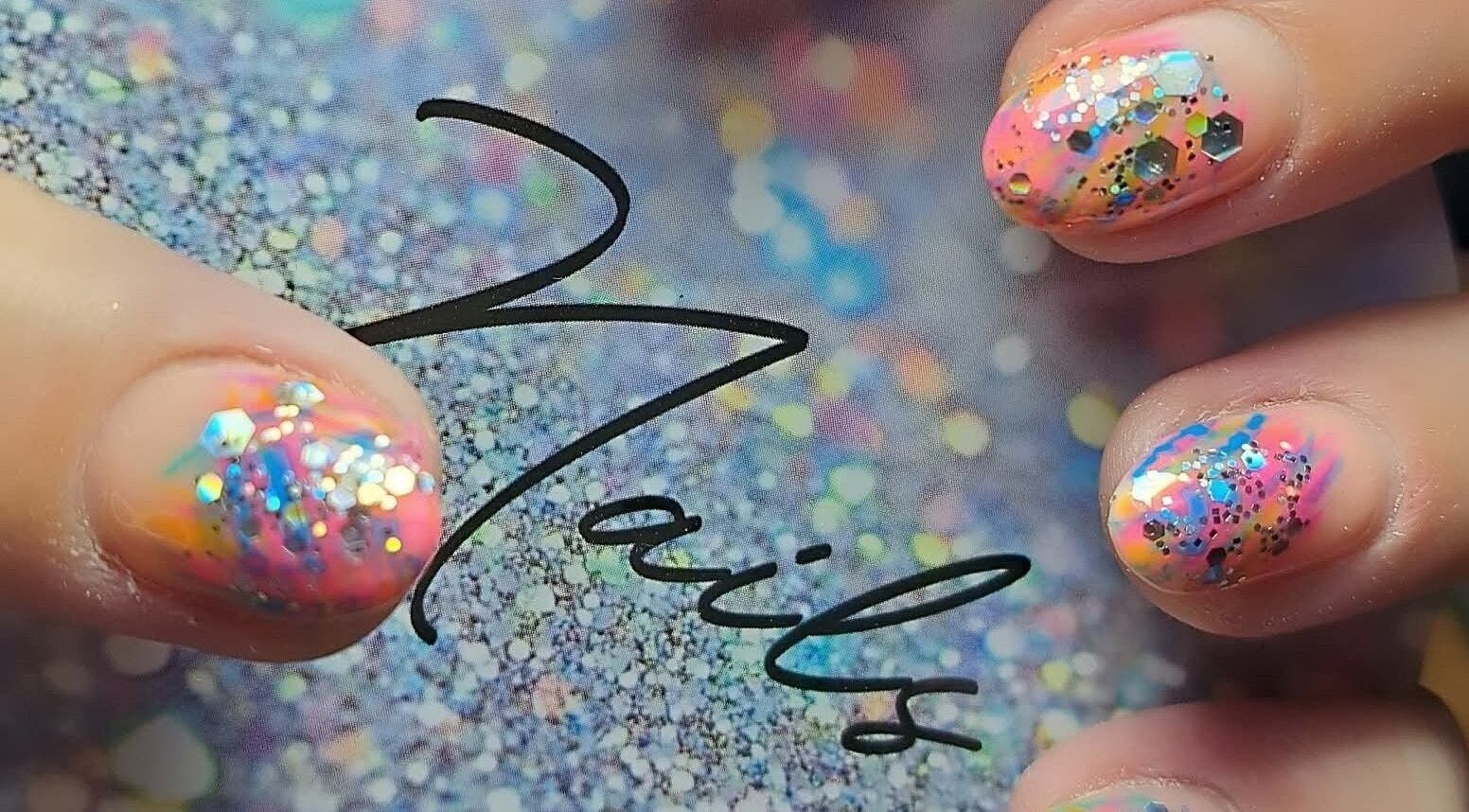 Colorful glitter nail art at Luna Rose Nail Bar, Benoni, Gauteng, ZA. Eye-catching and vibrant.