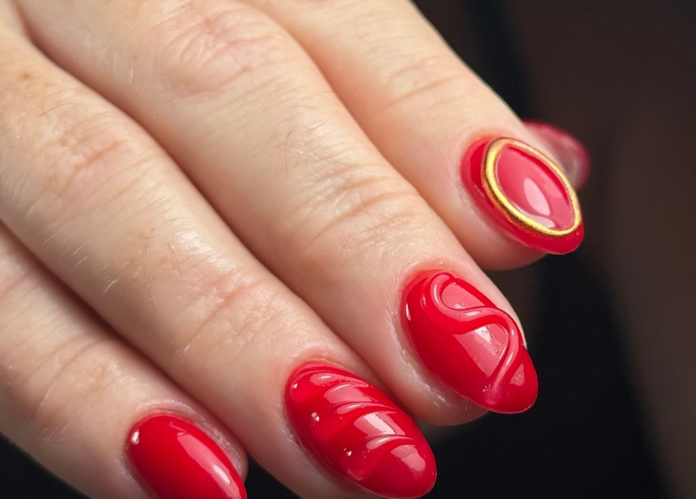Vibrant red nail art at Delmarrr.studio, Toa alta, Bayamón, PR showcases elegance and style.