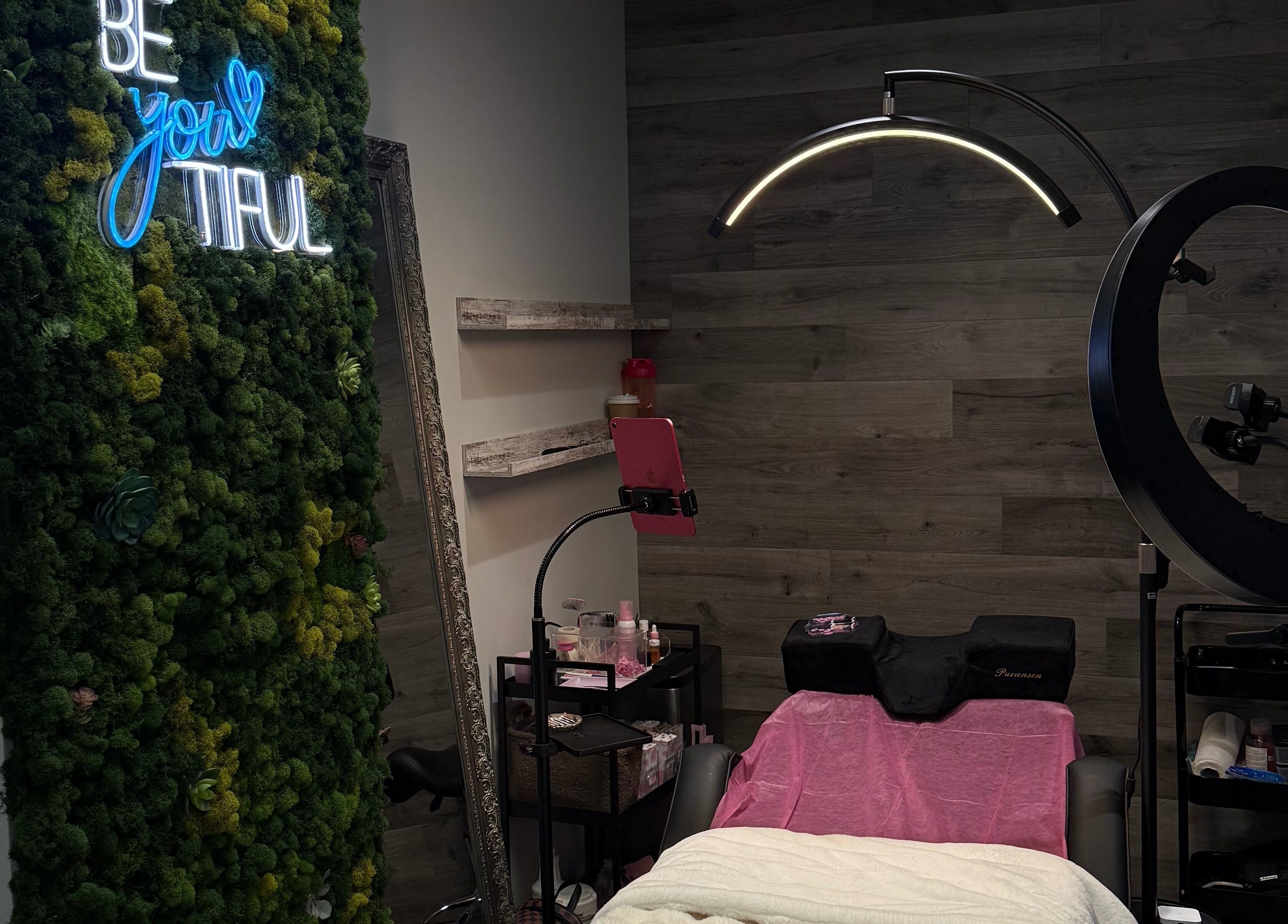 Serene beauty room at Lash Shawty West Broadway, Vancouver, British Columbia, CA with lush greenery decor.